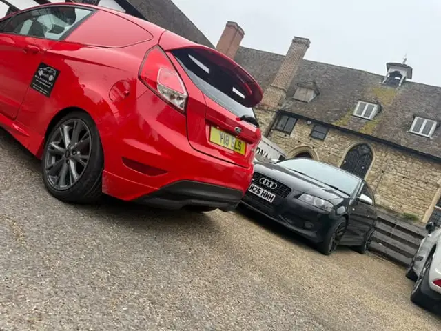 Mobile mechanic callout: the red BLS Ecoboosts Fiesta with an Audi A3 on site
